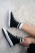 کفش ورزشی مدل گردن‌دار مشکی و سفید یونی‌سکس