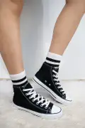 کفش ورزشی مدل گردن‌دار مشکی و سفید یونی‌سکس