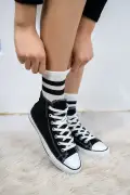 کفش ورزشی مدل گردن‌دار مشکی و سفید یونی‌سکس