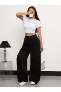 شلوار جین زنانه پتروئلا مدل 90's با پاچه گشاد و کمر بسیار بلند رنگ مشکی