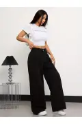 شلوار جین زنانه پتروئلا مدل 90's با پاچه گشاد و کمر بسیار بلند رنگ مشکی