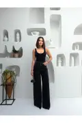 شلوار جین بگgy زنانه با سنگ‌های تزئینی، کمر بلند و پاچه‌های گشاد، مشکی