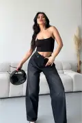 شلوار جین زنانه بگی با برش گشاد و شستشوی شیمیایی مدل بایکی مشکی 4001