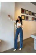 شلوار گشاد زنانه با طراحی خاص و رنگ آبی با کمر بلند