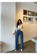 شلوار گشاد زنانه با طراحی خاص و رنگ آبی با کمر بلند
