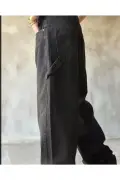 شلوار جین پلوژ با کمر مشکی و گیره جانبی