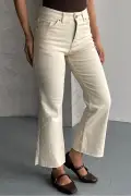جین کمر جذب با پاچه برش خورده بژ