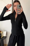 بلوز ورزشی زنانه کادین با آستین بلند و زیپ دار و جیب دار مشکی