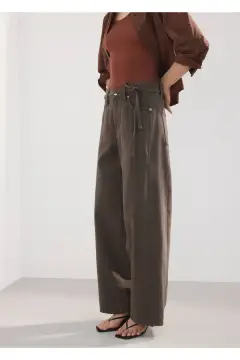 شلوار جین پاچه گشاد با بند