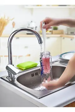 شیشه شیر و برس تمیز کننده شیشه به رنگ صورتی