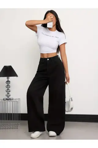شلوار جین زنانه پتروئلا مدل 90's با پاچه گشاد و کمر بسیار بلند رنگ مشکی