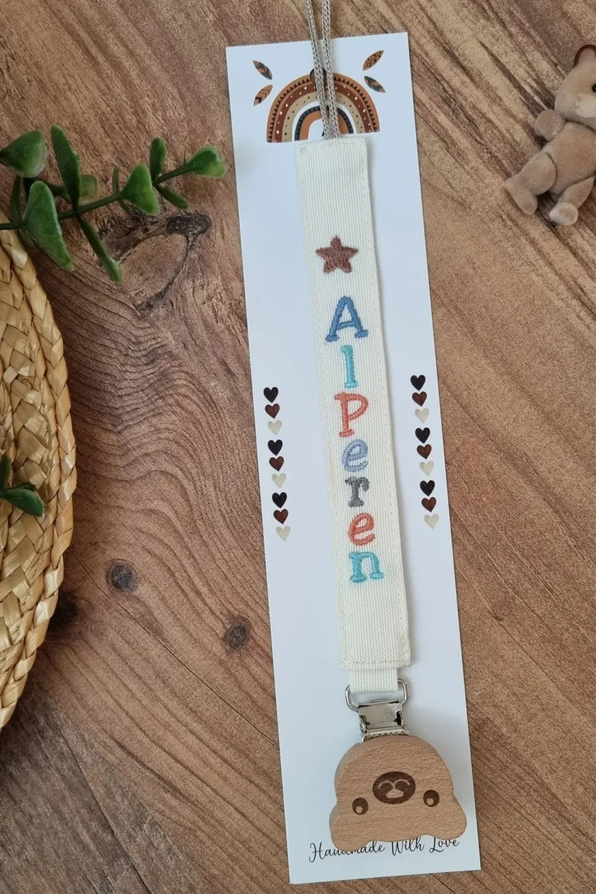 گیره دندان‌گیر رنگارنگ با کلیپس چوبی